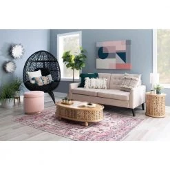 Elia 42 in. Natural 12 in. H Oval Hand-Carved Mango Wood Coffee Table by Powell Company -Powell Company Shop natural powell company coffee tables hd1716ct21 1f 1000