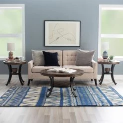 36 in. Oak Medium Round Wood Coffee Table with Shelf by Powell Company -Powell Company Shop oak powell company coffee tables 16a8243ct 1f 1000