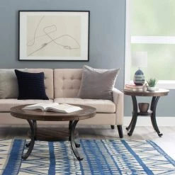 36 in. Oak Medium Round Wood Coffee Table with Shelf by Powell Company -Powell Company Shop oak powell company coffee tables 16a8243ct 4f 1000