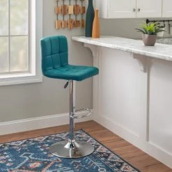 Chad 35.6 in. H - 44 in. H Teal Faux Leather Chrome Adjustable Barstool with Faux Leather Seat by Powell Company -Powell Company Shop teal powell company bar stools hd1673bs21 31 1000