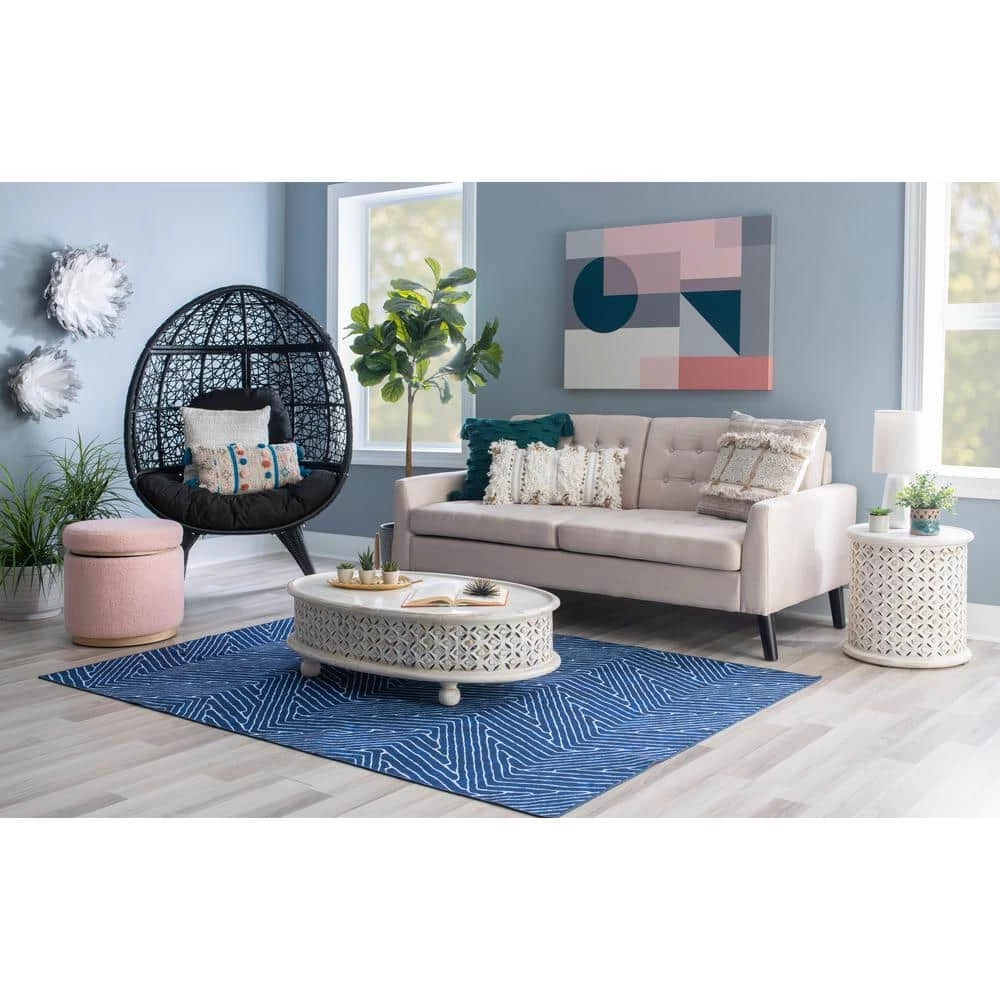 Elia 42 in. White 12 in. H Oval Hand-Carved Mango Wood Coffee Table by Powell Company 8 Elia 42 in. White 12 in. H Oval Hand-Carved Mango Wood Coffee Table by Powell Company - Image 6