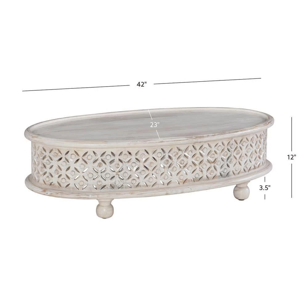 Elia 42 in. White 12 in. H Oval Hand-Carved Mango Wood Coffee Table by Powell Company 9 Elia 42 in. White 12 in. H Oval Hand-Carved Mango Wood Coffee Table by Powell Company - Image 7